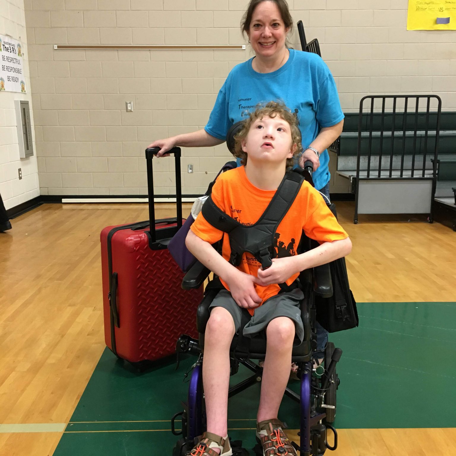 woman with child in wheelchair